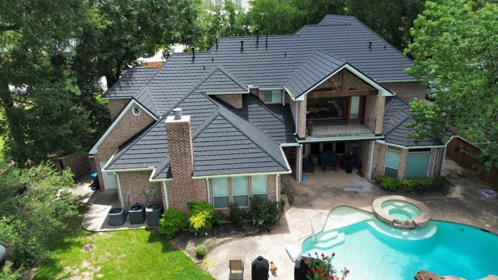 DECRA Shake XD stone-coated steel roof in Midnight Eclipse on a high-value home