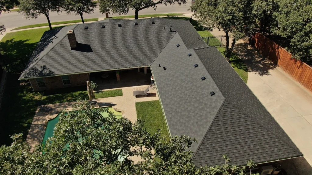 DECRA Shingle XD stone-coated steel roof in Midnight Eclipse on a premium home