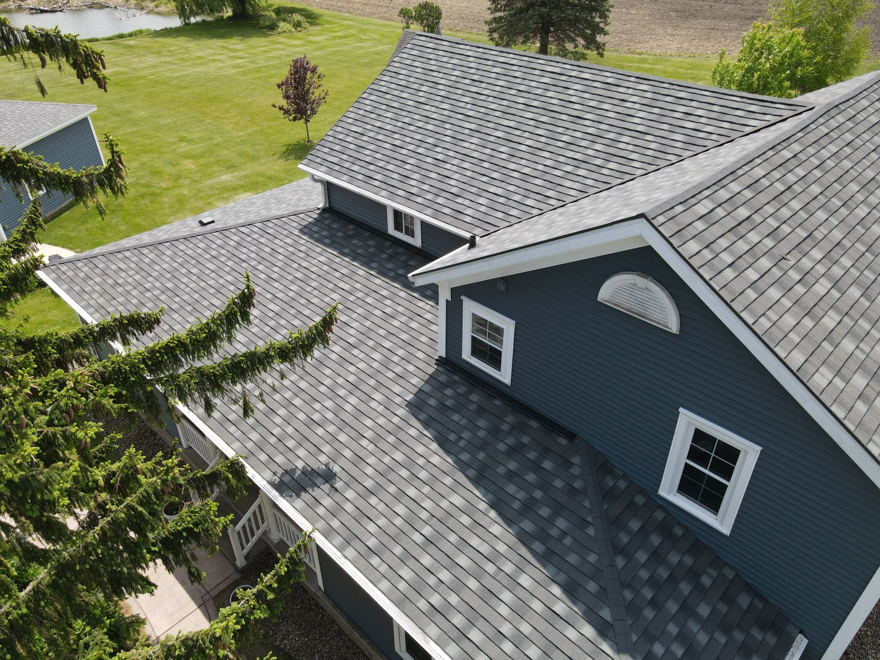 DECRA Shingle XD stone-coated steel roof in Natural Slate on a residential home