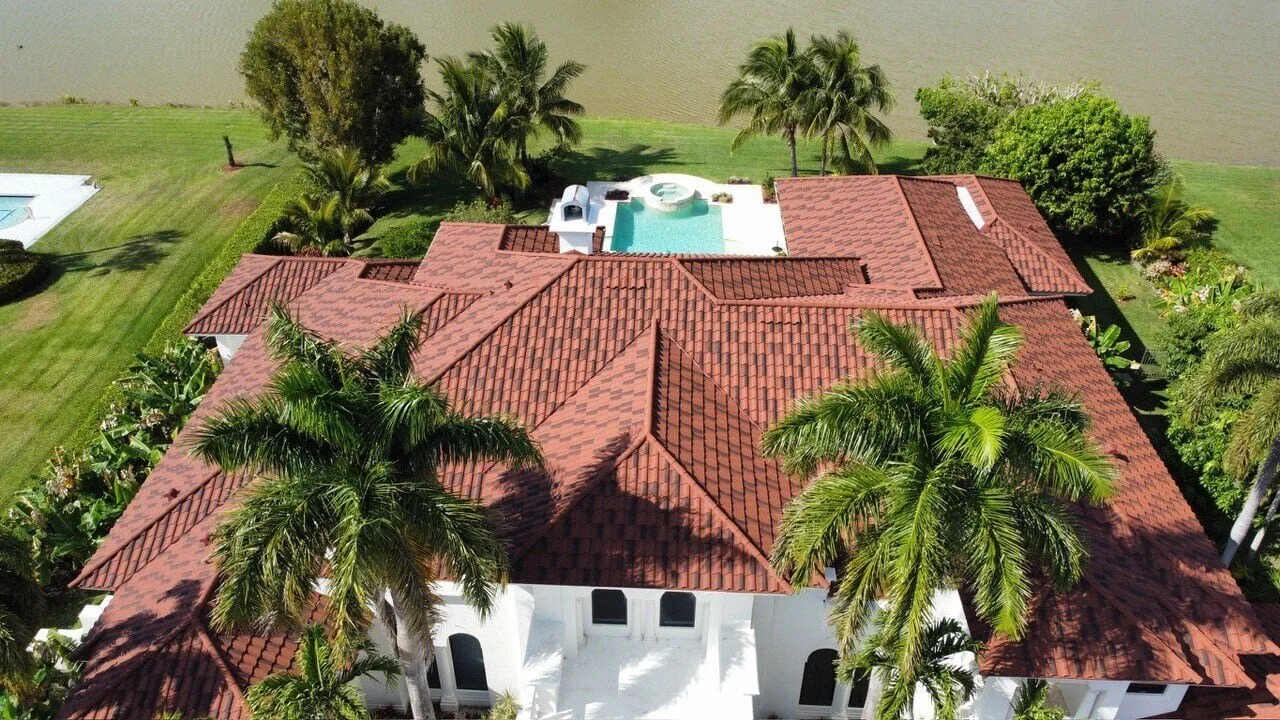 DECRA Villa Tile stone-coated steel roof in Rustico Clay on a luxury home